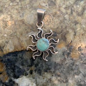 Sun pendant, sterling silver.